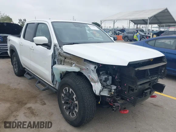 ✅ 2023 Nissan Frontier Pro-X • VIN: 1N6ED1EJ7PN668759 • Lot: 44570580. Listed on IAAI with 26,285 mi. Free auction sales archive from the USA and detailed vehicle history report at DreamBid. Image 1.