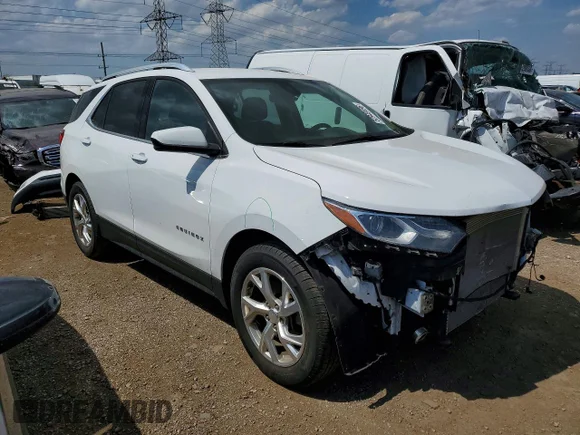 ✅ 2020 Chevrolet Equinox LT • VIN: 2GNAXLEX3L6124077 • Lot: 52949496. Listed on Copart with 101,338 mi. Free auction sales archive from the USA and detailed vehicle history report at DreamBid. Image 4.
