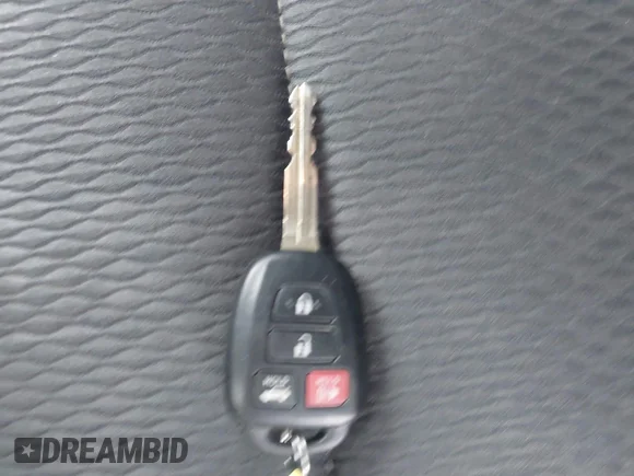 ✅ 2018 Toyota Corolla LE • VIN: 5YFBURHE4JP797944 • Lot: 43825037. Listed on IAAI with 121,094 mi. Free auction sales archive from the USA and detailed vehicle history report at DreamBid. Image 11.