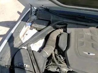 ✅ 2018 Genesis G80 3.8L • VIN: KMHGN4JE8JU244356 • Lot: 84016465. Listed on Copart with 70,489 mi. Free auction sales archive from the USA and detailed vehicle history report at DreamBid. Image 15.