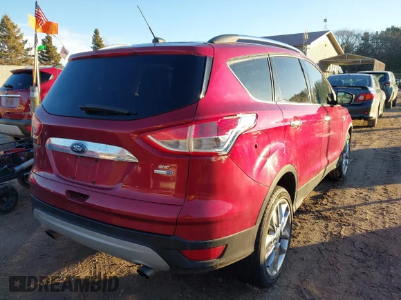 ✅ 2014 Ford Escape SE • VIN: 1FMCU9G90EUE26390 • Lot: 44107064. Listed on IAAI with 132,604 mi. Free auction sales archive from the USA and detailed vehicle history report at DreamBid. Image 4.
