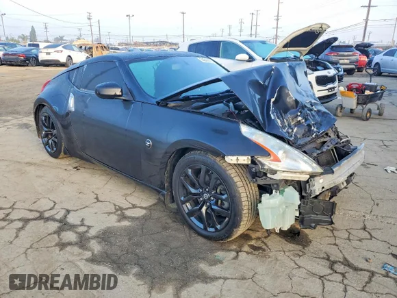 ✅ 2016 Nissan 370Z • VIN: JN1AZ4EH8GM930623 • Lot: 74640875. Wystawiony na Copart z przebiegiem 114 499 mil. Bezpłatny archiwum sprzedaży aukcyjnych z USA i szczegółowy raport historii pojazdu na DreamBid. Zdjęcie 4.
