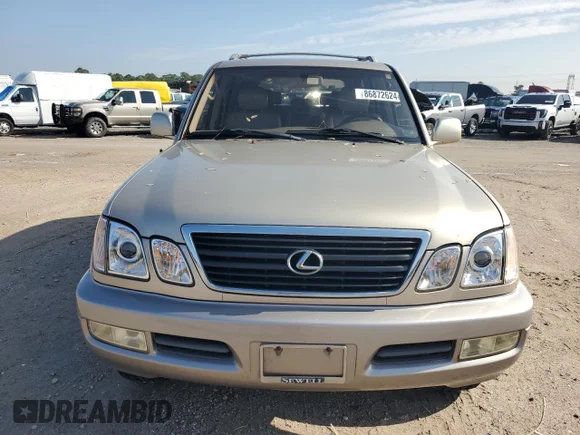 ✅ 2000 Lexus LX 470 • VIN: JT6HT00W1Y0104773 • Lot: 86872624. Listed on Copart with 193,283 mi. Free auction sales archive from the USA and detailed vehicle history report at DreamBid. Image 5.