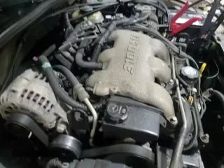 2002 Chevrolet Malibu z VIN 1G1ND52J72M641843, wystawiony jako Copart lot #84057954 z przebiegiem 125 501 mil mil oraz Szkoda całkowita • Salvage title. Historia ofert i sprzedaży dostępna na DreamBid. Obrazek 13.