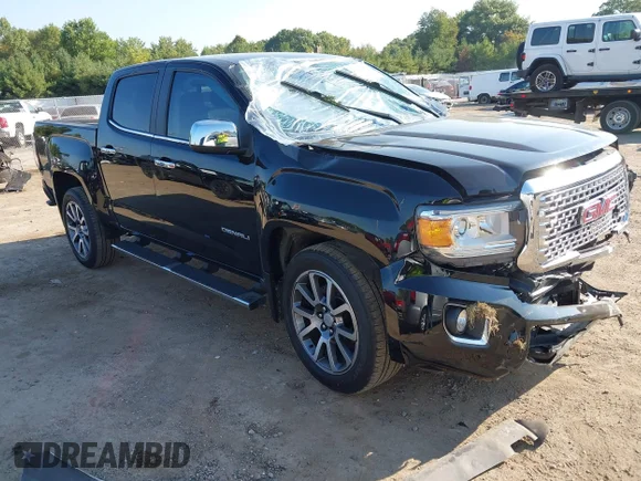 ✅ 2020 GMC Canyon 4WD Denali • VIN: 1GTG6EEN0L1121365 • Лот: 43268487. Опубликован ранее на IAAI с пробегом 96 624 миль. Бесплатный доступ к архиву аукционных продаж из США и подробный отчёт об истории автомобиля на DreamBid. Изображение 1.