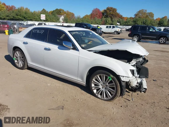 ✅ 2013 Chrysler 300 C • VIN: 2C3CCAEG8DH532666 • Lot: 43596317. Listed on IAAI with 127,711 mi. Free auction sales archive from the USA and detailed vehicle history report at DreamBid. Image 1.