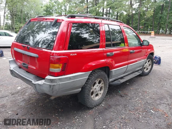 ✅ 2000 Jeep Grand Cherokee Laredo • VIN: 1J4GW48S7YC409319 • Лот: 42839110. Опубликован ранее на IAAI с пробегом 204 982 миль. Бесплатный доступ к архиву аукционных продаж из США и подробный отчёт об истории автомобиля на DreamBid. Изображение 4.