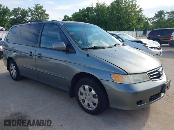 ✅ 2002 Honda Odyssey EX • VIN: 2HKRL18682H573537 • Лот: 45291335. Опубликован ранее на IAAI с пробегом 127 223 миль. Бесплатный доступ к архиву аукционных продаж из США и подробный отчёт об истории автомобиля на DreamBid. Изображение 1.