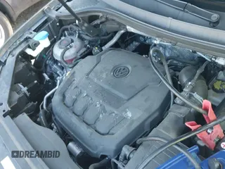 ✅ 2021 Volkswagen Tiguan S • VIN: 3VV1B7AX1MM045231 • Lot: 43025673. Wystawiony na IAAI z przebiegiem 19 010 mil. Bezpłatny archiwum sprzedaży aukcyjnych z USA i szczegółowy raport historii pojazdu na DreamBid. Zdjęcie 19.