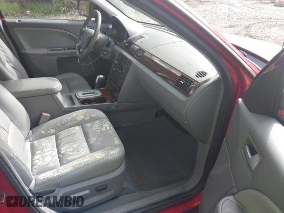 ✅ 2007 Ford Five Hundred SEL • VIN: 1FAHP24167G130174 • Лот: 43049404. Опубліковано раніше на IAAI з пробігом 133 068 миль. Безкоштовний доступ до архіву аукціонних продажів зі США та докладний звіт про історію автомобіля на DreamBid. Зображення 5.