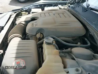 2014 Dodge Challenger SXT 100th Anniversary z VIN 2C3CDYAGXEH298415, wystawiony jako IAAI lot #42133602 z przebiegiem 126 523 mil mil oraz . Historia ofert i sprzedaży dostępna na DreamBid. Obrazek 20.