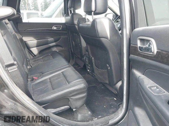 ✅ 2012 Jeep Grand Cherokee Laredo Altitude • VIN: 1C4RJFAT3CC351276 • Lot: 44259898. Wystawiony na IAAI z przebiegiem 154 940 mil. Bezpłatny archiwum sprzedaży aukcyjnych z USA i szczegółowy raport historii pojazdu na DreamBid. Zdjęcie 8.