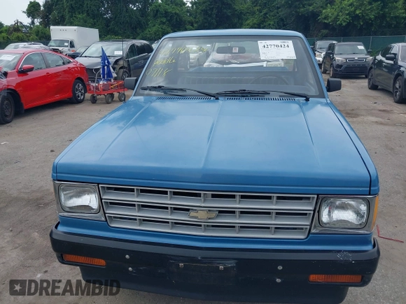 ✅ 1985 Chevrolet S10 • VIN: 1GCBS14A9F2198506 • Lot: 42770424. Wystawiony na IAAI z przebiegiem 50 440 mil. Bezpłatny archiwum sprzedaży aukcyjnych z USA i szczegółowy raport historii pojazdu na DreamBid. Zdjęcie 6.
