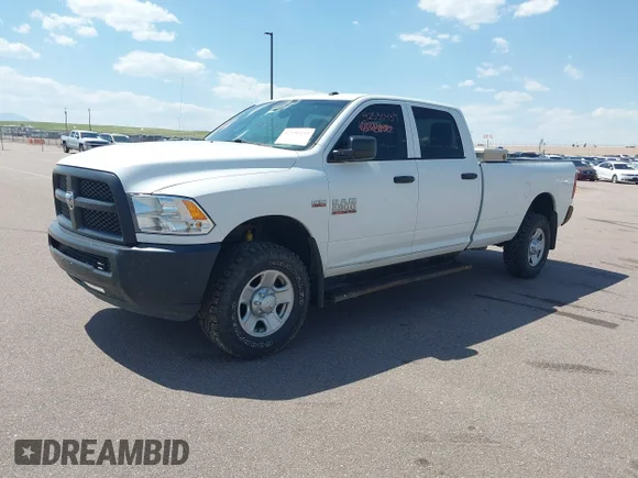 ✅ 2014 Ram 2500 Tradesman • VIN: 3C6UR5HJ6EG243386 • Lot: 42530439. Listed on IAAI with 229,689 mi. Free auction sales archive from the USA and detailed vehicle history report at DreamBid. Image 2.
