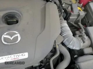 ✅ 2022 Mazda CX-5 2.5 Turbo • VIN: JM3KFBAY0N0588973 • Лот: 81205225. Опубликован ранее на Copart с пробегом 38 894 миль. Бесплатный доступ к архиву аукционных продаж из США и подробный отчёт об истории автомобиля на DreamBid. Изображение 15.