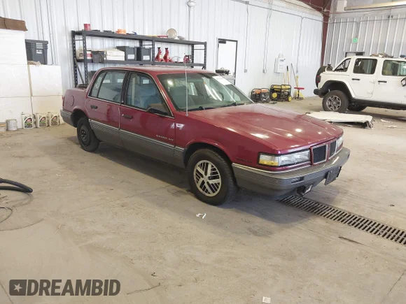 ✅ 1988 Pontiac Grand Am • VIN: 1G2NV54D5JC787078 • Lot: 43170023. Listed on IAAI with 67,768 mi. Free auction sales archive from the USA and detailed vehicle history report at DreamBid. Image 1.