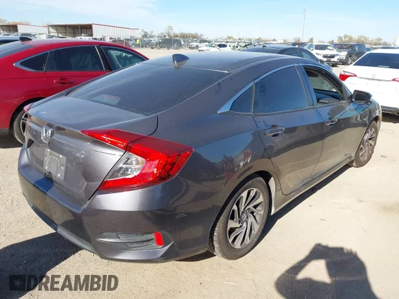 ✅ 2018 Honda Civic EX • VIN: 2HGFC2F77JH571243 • Lot: 43912802. Listed on IAAI with 129,770 mi. Free auction sales archive from the USA and detailed vehicle history report at DreamBid. Image 4.