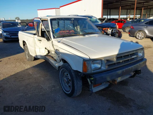 ✅ 1987 Mazda B-Series SE5 • VIN: JM2UF111XH0583181 • Lot: 43767203. Wystawiony na IAAI z przebiegiem 131 862 mil. Bezpłatny archiwum sprzedaży aukcyjnych z USA i szczegółowy raport historii pojazdu na DreamBid. Zdjęcie 1.