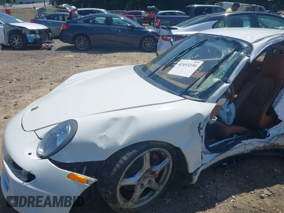 ✅ 2007 Porsche 911 Carrera S • VIN: WP0AB299X7S732114 • Лот: 42453230. Опубліковано раніше на IAAI з пробігом 111 542 миль. Безкоштовний доступ до архіву аукціонних продажів зі США та докладний звіт про історію автомобіля на DreamBid. Зображення 6.