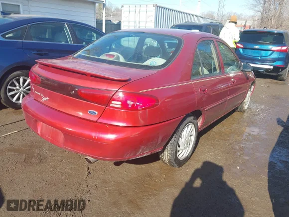 ✅ 1999 Ford Escort SE • VIN: 1FAFP13P6XW180845 • Lot: 41398242. Listed on IAAI with 59,300 mi. Free auction sales archive from the USA and detailed vehicle history report at DreamBid. Image 4.