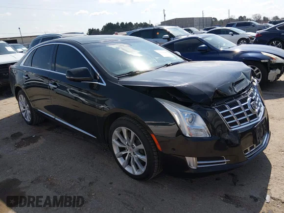 ✅ 2015 Cadillac XTS Luxury • VIN: 2G61M5S38F9228634 • Лот: 44390661. Опубликован ранее на IAAI с пробегом 114 009 миль. Бесплатный доступ к архиву аукционных продаж из США и подробный отчёт об истории автомобиля на DreamBid. Изображение 1.