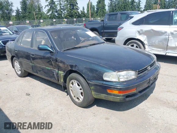 ✅ 1994 Toyota Camry XLE • VIN: 4T1GK13E2RU055699 • Lot: 42881330. Wystawiony na IAAI z przebiegiem 98 977 mil. Bezpłatny archiwum sprzedaży aukcyjnych z USA i szczegółowy raport historii pojazdu na DreamBid. Zdjęcie 1.