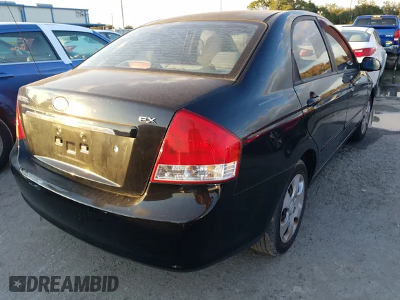 ✅ 2009 Kia Spectra EX • VIN: KNAFE221995651623 • Лот: 51850375. Опубликован ранее на Copart с пробегом 190 961 миль. Бесплатный доступ к архиву аукционных продаж из США и подробный отчёт об истории автомобиля на DreamBid. Изображение 4.