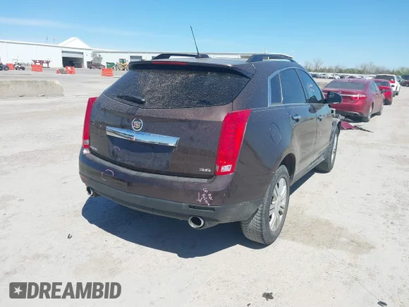 ✅ 2015 Cadillac SRX • VIN: 3GYFNAE35FS641659 • Лот: 41870673. Опубліковано раніше на IAAI з пробігом 127 182 миль. Безкоштовний доступ до архіву аукціонних продажів зі США та докладний звіт про історію автомобіля на DreamBid. Зображення 4.