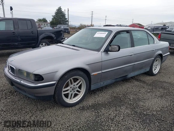 ✅ 1998 BMW 7 Series 740iL • VIN: WBAGJ8327WDM18660 • Лот: 43588068. Опубликован ранее на IAAI с пробегом 292 541 миль. Бесплатный доступ к архиву аукционных продаж из США и подробный отчёт об истории автомобиля на DreamBid. Изображение 2.