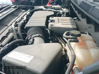 2021 Chevrolet Silverado 1500 Custom z VIN 3GCPYBEK2MG185408, wystawiony jako IAAI lot #43356582 z przebiegiem 98 706 mil mil oraz . Historia ofert i sprzedaży dostępna na DreamBid. Obrazek 19.