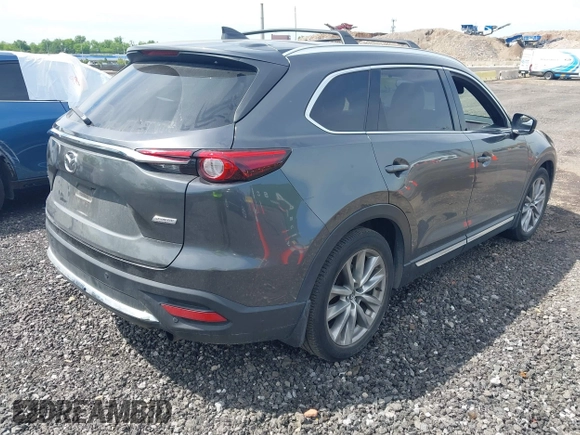 ✅ 2016 Mazda CX-9 Grand Touring • VIN: JM3TCBDY6G0117924 • Lot: 45184149. Wystawiony na IAAI z przebiegiem 166 227 mil. Bezpłatny archiwum sprzedaży aukcyjnych z USA i szczegółowy raport historii pojazdu na DreamBid. Zdjęcie 4.