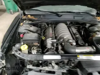 ✅ 2008 Dodge Challenger SRT-8 • VIN: 2B3LJ74W18H302861 • Lot: 82631424. Wystawiony na Copart z przebiegiem 86 743 mil. Bezpłatny archiwum sprzedaży aukcyjnych z USA i szczegółowy raport historii pojazdu na DreamBid. Zdjęcie 14.