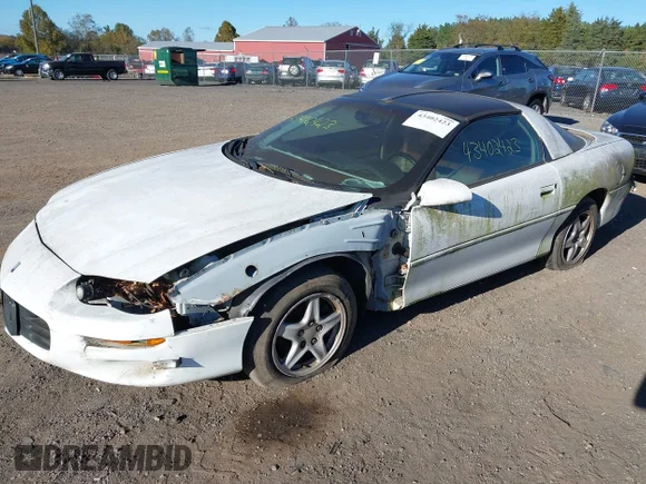 ✅ 1999 Chevrolet Camaro • VIN: 2G1FP22KXX2128585 • Lot: 43402423. Wystawiony na IAAI z przebiegiem 180 136 mil. Bezpłatny archiwum sprzedaży aukcyjnych z USA i szczegółowy raport historii pojazdu na DreamBid. Zdjęcie 2.