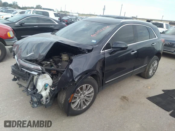 ✅ 2017 Cadillac XT5 Luxury FWD • VIN: 1GYKNBRS3HZ162880 • Лот: 41005234. Опубліковано раніше на IAAI з пробігом 93 288 миль. Безкоштовний доступ до архіву аукціонних продажів зі США та докладний звіт про історію автомобіля на DreamBid. Зображення 18.