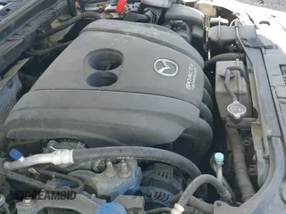 ✅ 2015 Mazda 3 i SV • VIN: JM1BM1T79F1241411 • Лот: 42055883. Опубликован ранее на IAAI с пробегом 85 181 миль. Бесплатный доступ к архиву аукционных продаж из США и подробный отчёт об истории автомобиля на DreamBid. Изображение 19.