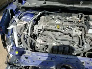 ✅ 2023 Toyota Corolla Cross LE • VIN: 7MUBAABG8PV072471 • Lot: 57951665. Wystawiony na Copart z przebiegiem 26 383 mil. Bezpłatny archiwum sprzedaży aukcyjnych z USA i szczegółowy raport historii pojazdu na DreamBid. Zdjęcie 15.