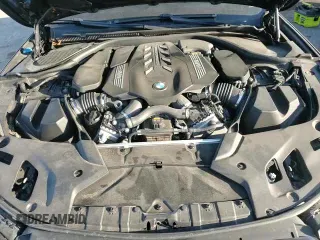 ✅ 2021 BMW 5 Series M550i xDrive • VIN: WBA13BK00MCG26690 • Lot: 93568435. Listed on Copart with 142,409 mi. Free auction sales archive from the USA and detailed vehicle history report at DreamBid. Image 13.