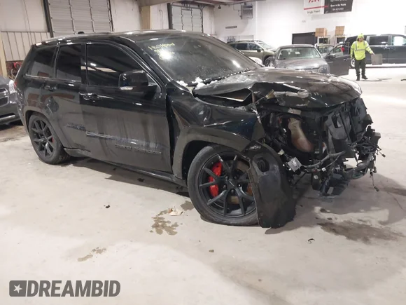 ✅ 2018 Jeep Grand Cherokee SRT • VIN: 1C4RJFDJ7JC249888 • Lot: 44284459. Listed on IAAI with 70,872 mi. Free auction sales archive from the USA and detailed vehicle history report at DreamBid. Image 1.