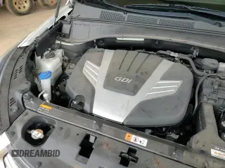 2017 Hyundai Santa Fe SE z VIN KM8SMDHF1HU226173, wystawiony jako Copart lot #68544205 z przebiegiem 103 190 mil mil oraz Szkoda całkowita • Salvage title. Historia ofert i sprzedaży dostępna na DreamBid. Obrazek 16.