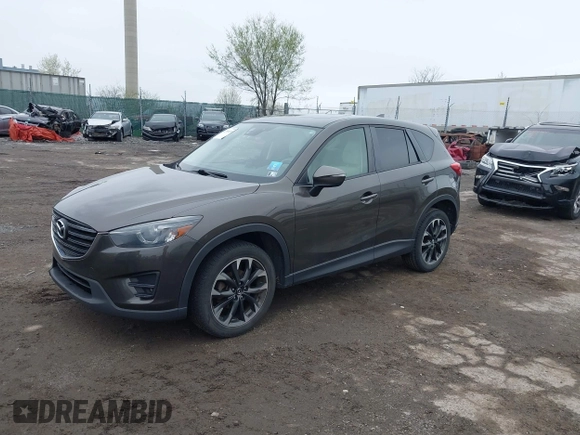 ✅ 2016 Mazda CX-5 Grand Touring • VIN: JM3KE4DY5G0604386 • Lot: 44793619. Wystawiony na IAAI z przebiegiem 202 557 mil. Bezpłatny archiwum sprzedaży aukcyjnych z USA i szczegółowy raport historii pojazdu na DreamBid. Zdjęcie 6.