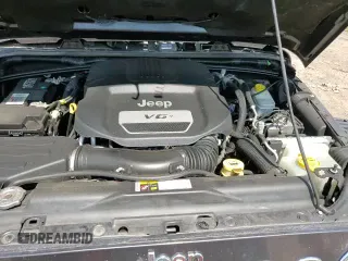 ✅ 2018 Jeep Wrangler Unlimited Sahara • VIN: 1C4BJWEGXJL848692 • Lot: 80248515. Wystawiony na Copart z przebiegiem 92 282 mil. Bezpłatny archiwum sprzedaży aukcyjnych z USA i szczegółowy raport historii pojazdu na DreamBid. Zdjęcie 16.