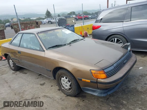 ✅ 1988 Toyota Celica • VIN: JT2ST66C6J7261994 • Lot: 44426935. Listed on IAAI with 124,176 mi. Free auction sales archive from the USA and detailed vehicle history report at DreamBid. Image 1.