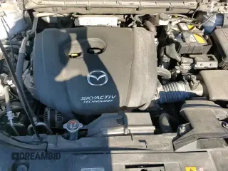 ✅ 2019 Mazda CX-5 Grand Touring • VIN: JM3KFADM3K0607708 • Lot: 82386235. Wystawiony na Copart z przebiegiem 79 886 mil. Bezpłatny archiwum sprzedaży aukcyjnych z USA i szczegółowy raport historii pojazdu na DreamBid. Zdjęcie 15.