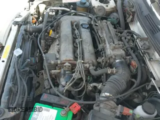 ✅ 1999 Infiniti G20 • VIN: JNKCP11A9XT003055 • Lot: 42159445. Wystawiony na IAAI z przebiegiem 247 328 mil. Bezpłatny archiwum sprzedaży aukcyjnych z USA i szczegółowy raport historii pojazdu na DreamBid. Zdjęcie 12.