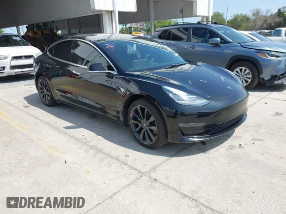 ✅ 2018 Tesla Model 3 Long Range Battery • VIN: 5YJ3E1EA0JF075936 • Lot: 44610863. Listed on IAAI with 96,715 mi. Free auction sales archive from the USA and detailed vehicle history report at DreamBid. Image 1.