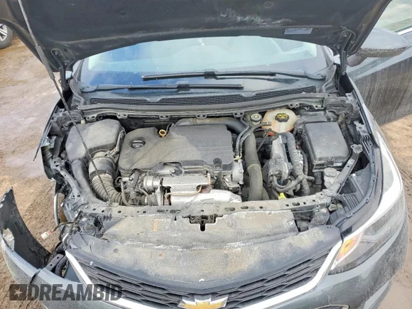 ✅ 2018 Chevrolet Cruze LT • VIN: 3G1BE6SM1JS651394 • Лот: 77184915. Опубліковано раніше на Copart з пробігом 84 356 миль. Безкоштовний доступ до архіву аукціонних продажів зі США та докладний звіт про історію автомобіля на DreamBid. Зображення 11.