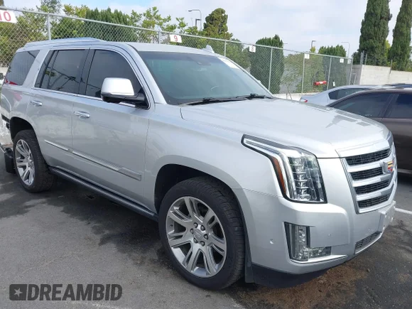 ✅ 2019 Cadillac Escalade Premium Luxury • VIN: 1GYS4CKJ1KR254104 • Лот: 42639061. Опубликован ранее на IAAI с пробегом 94 619 миль. Бесплатный доступ к архиву аукционных продаж из США и подробный отчёт об истории автомобиля на DreamBid. Изображение 1.