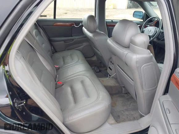 ✅ 2003 Cadillac DeVille • VIN: 1G6KD54Y83U130019 • Lot: 42377963. Wystawiony na IAAI z przebiegiem 92 802 mil. Bezpłatny archiwum sprzedaży aukcyjnych z USA i szczegółowy raport historii pojazdu na DreamBid. Zdjęcie 8.