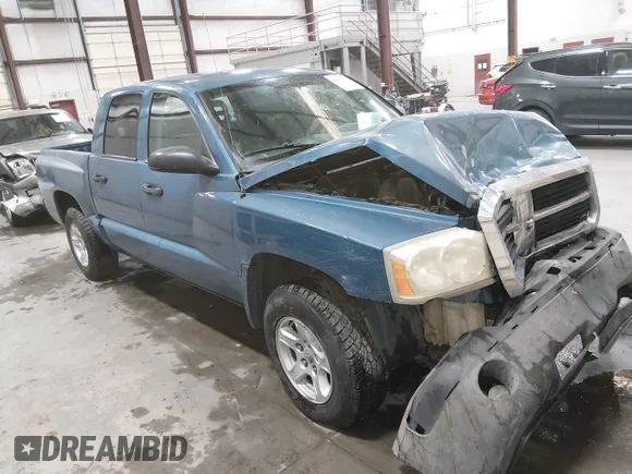 ✅ 2005 Dodge Dakota SLT • VIN: 1D7HE48N85S263592 • Lot: 45261510. Listed on IAAI with 218,480 mi. Free auction sales archive from the USA and detailed vehicle history report at DreamBid. Image 1.