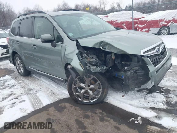 ✅ 2015 Subaru Forester Touring • VIN: JF2SJAWC5FH572514 • Lot: 44161405. Listed on IAAI with 212,062 mi. Free auction sales archive from the USA and detailed vehicle history report at DreamBid. Image 1.